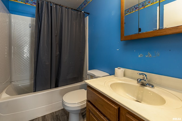 1500 W Tyler St, Herrin, IL 62948 - full bath featuring vanity, shower / bath combination with curtain, toilet, and wood finished floors