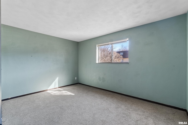 2501 26th Avenue Ct, Rock Island, IL 61201 - unfurnished room featuring baseboards and carpet floors
