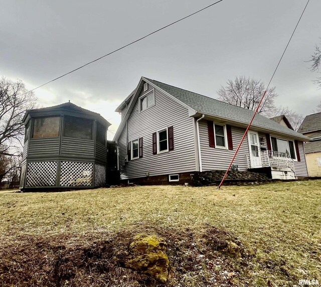 exterior space with a front lawn