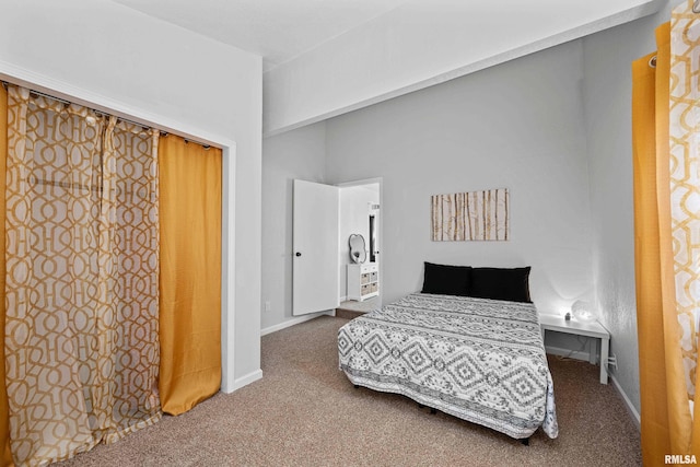 bedroom featuring baseboards and carpet flooring