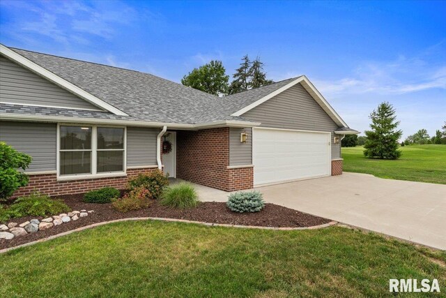 19109 Bluff Rd Unit D, Geneseo, IL 61254 - single story home with brick siding, a front lawn, a shingled roof, an attached garage, and driveway