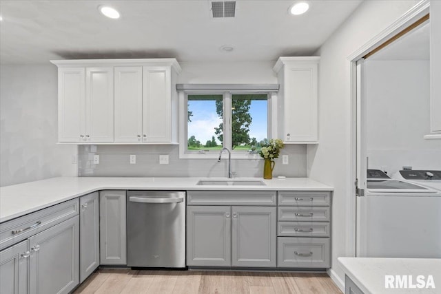19109 Bluff Rd Unit D, Geneseo, IL 61254 - kitchen featuring stainless steel dishwasher, light countertops, gray cabinets, decorative backsplash, and recessed lighting