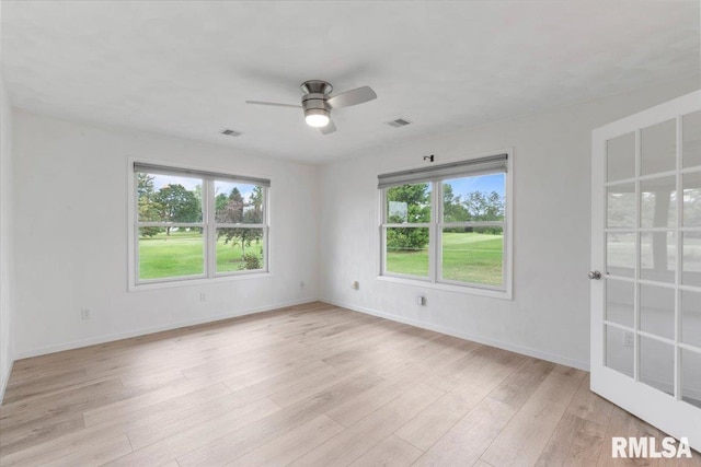 19109 Bluff Rd Unit D, Geneseo, IL 61254 - empty room with ceiling fan and light wood-style flooring
