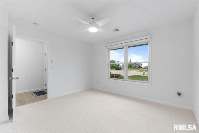 19109 Bluff Rd Unit D, Geneseo, IL 61254 - unfurnished room featuring light carpet and ceiling fan