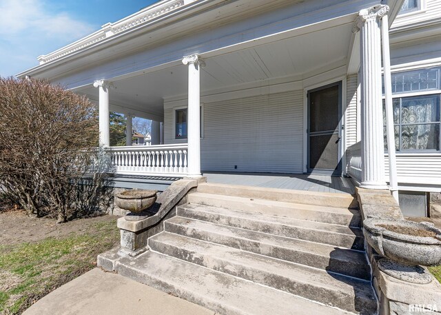 1440 12th St, Moline, IL 61265 - deck featuring a porch