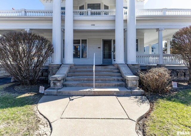 1440 12th St, Moline, IL 61265 - neoclassical / greek revival house with a balcony, covered porch, and a front lawn