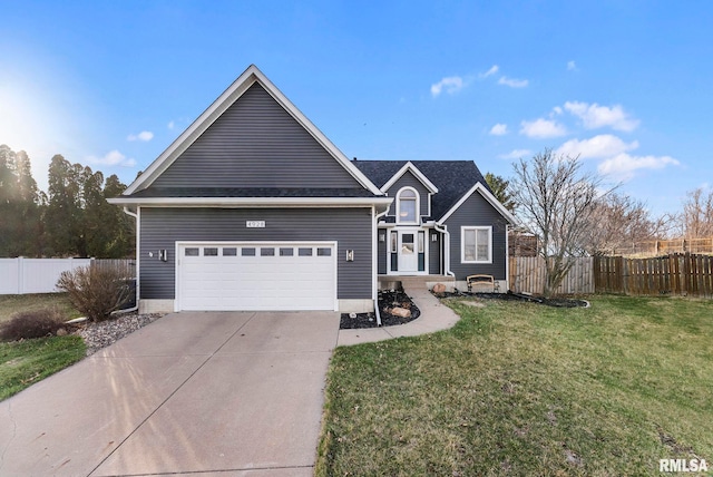 ranch-style house featuring a garage, fence, a front lawn, and concrete driveway
