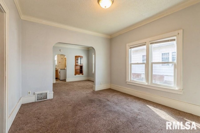 4227 11th St, Rock Island, IL 61201 - spare room with arched walkways, carpet flooring, ornamental molding, and visible vents