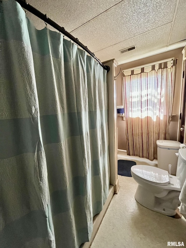 100 S Franklin St, Clayton, IL 62324 - bathroom with visible vents, toilet, and a shower with shower curtain