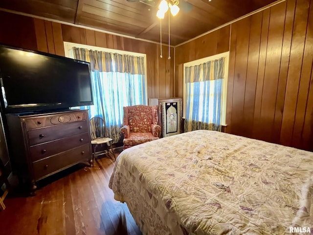 100 S Franklin St, Clayton, IL 62324 - bedroom with dark wood-style flooring, wood walls, multiple windows, and wood ceiling