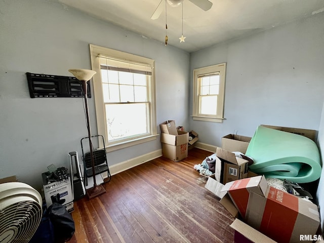 100 S Franklin St, Clayton, IL 62324 - misc room featuring wood-type flooring, baseboards, and ceiling fan