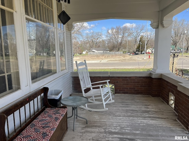 100 S Franklin St, Clayton, IL 62324 - wooden terrace with covered porch