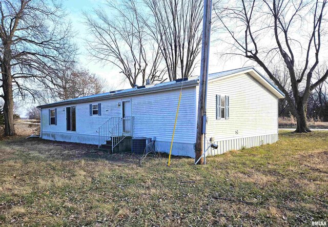 back of property with cooling unit