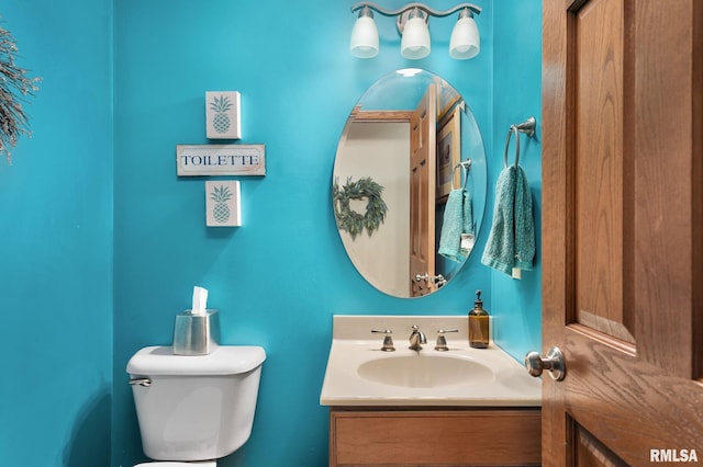 922 W Scott St, Eldridge, IA 52748 - half bathroom with toilet and vanity