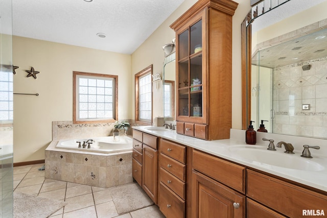 922 W Scott St, Eldridge, IA 52748 - bathroom with a shower stall, tile patterned floors, and a sink