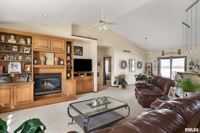 922 W Scott St, Eldridge, IA 52748 - living area with visible vents, a ceiling fan, light carpet, a glass covered fireplace, and vaulted ceiling