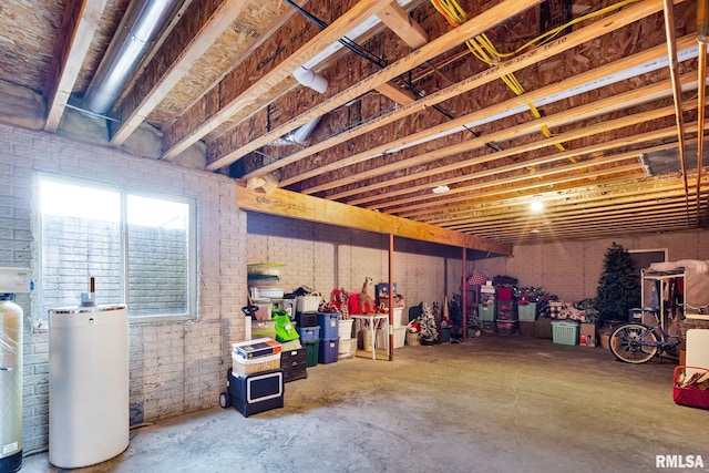 922 W Scott St, Eldridge, IA 52748 - basement featuring water heater and brick wall