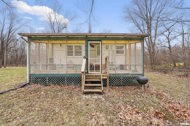 1435 Cedarview Dr, Muscatine, IA 52761 - view of outbuilding featuring a sunroom