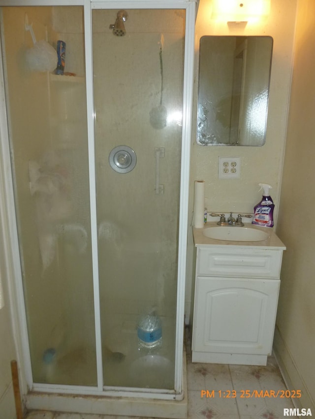 145 6th Ave, Moline, IL 61265 - bathroom featuring a shower stall, vanity, and tile patterned floors