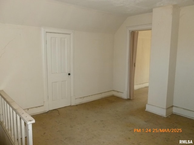 145 6th Ave, Moline, IL 61265 - additional living space featuring carpet flooring, vaulted ceiling, and baseboards