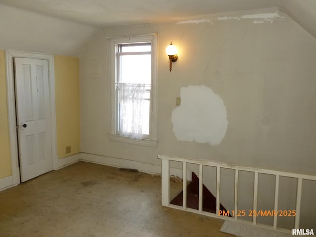 145 6th Ave, Moline, IL 61265 - additional living space with vaulted ceiling and carpet flooring
