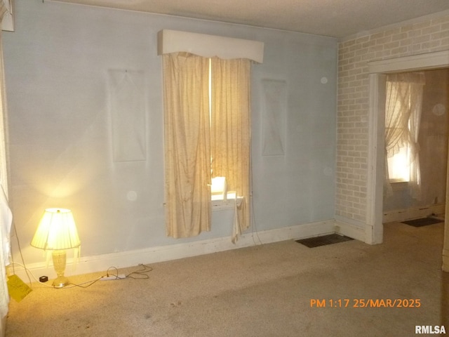 145 6th Ave, Moline, IL 61265 - carpeted spare room with baseboards