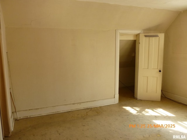145 6th Ave, Moline, IL 61265 - unfurnished bedroom with lofted ceiling