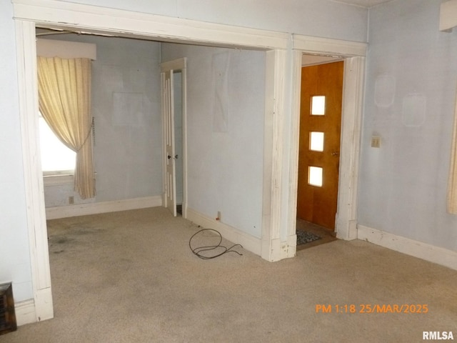 145 6th Ave, Moline, IL 61265 - spare room featuring carpet and baseboards