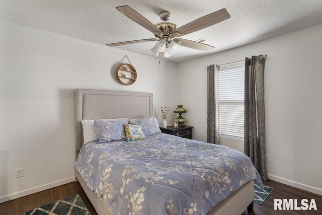 1708 Westport Dr, Davenport, IA 52804 - bedroom with baseboards, ceiling fan, and wood finished floors