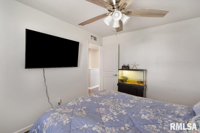 1708 Westport Dr, Davenport, IA 52804 - bedroom featuring ceiling fan and visible vents