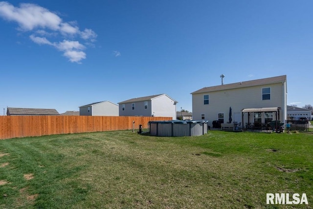 1708 Westport Dr, Davenport, IA 52804 - rear view of property with a lawn, a fenced in pool, and fence private yard