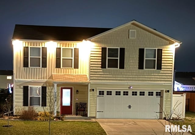 1708 Westport Dr, Davenport, IA 52804 - view of front of home with an attached garage, board and batten siding, a yard, and driveway