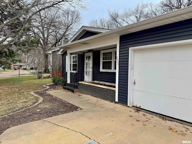 exterior space featuring a garage