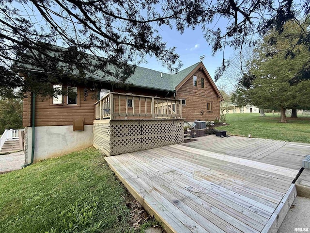 5453 Cherokee Ln, Carbondale, IL 62901 - deck with central AC unit and a lawn