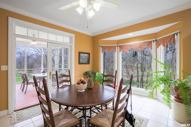 4996 Andrew Rd, Marion, IL 62959 - dining space featuring a ceiling fan, light tile patterned flooring, and ornamental molding