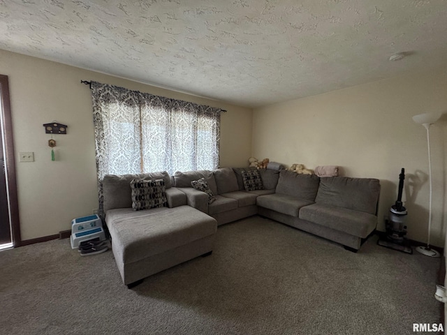 carpeted living room with a textured ceiling and baseboards
