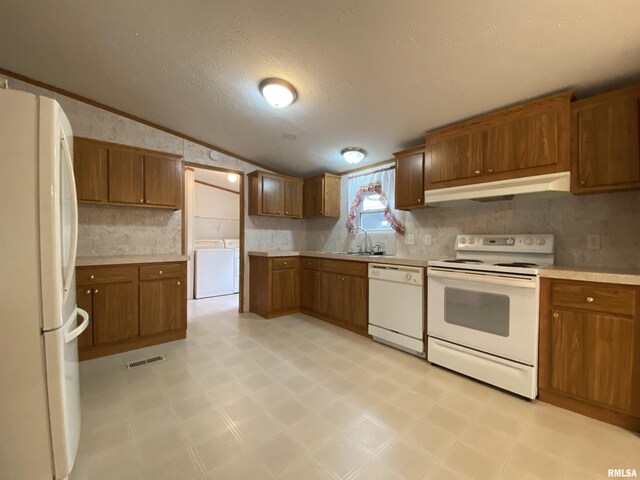 100 Little John Loop, Tunnel Hill, IL 62972 - kitchen featuring white appliances, a textured ceiling, light countertops, and brown cabinets