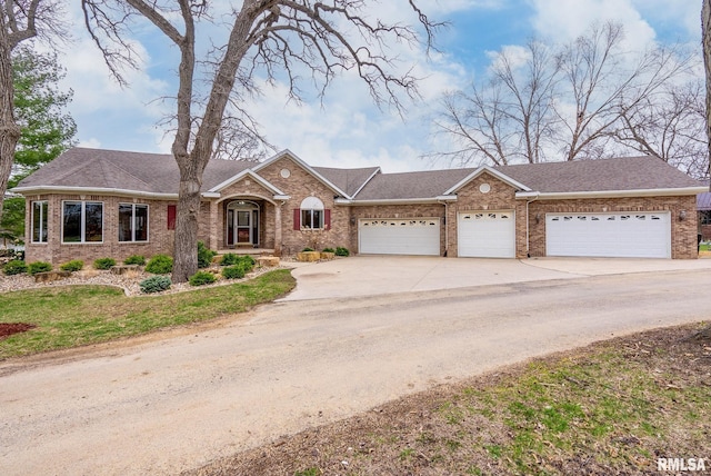 ranch-style house featuring concrete driveway, an attached garage, brick siding, roof with shingles, and a front lawn