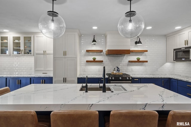 kitchen with open shelves, blue cabinets, tasteful backsplash, white cabinets, and recessed lighting