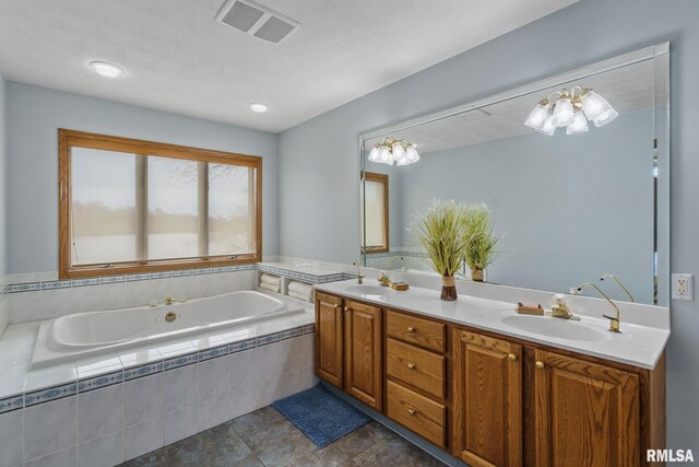 full bath with a bath and double vanity