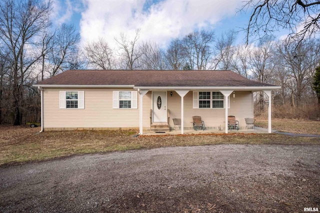 12855 Cleveland Ln, Pittsburg, IL 62974 - ranch-style home featuring roof with shingles and entry steps