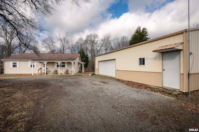 12855 Cleveland Ln, Pittsburg, IL 62974 - exterior space with a garage and an outdoor structure