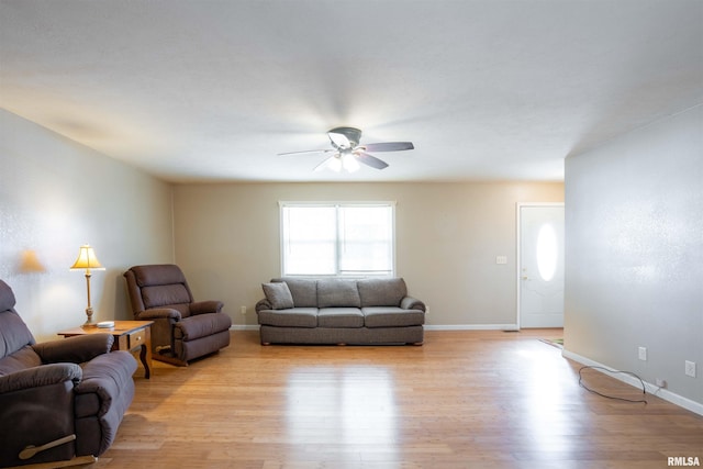 12855 Cleveland Ln, Pittsburg, IL 62974 - living room featuring ceiling fan, light wood-type flooring, and baseboards