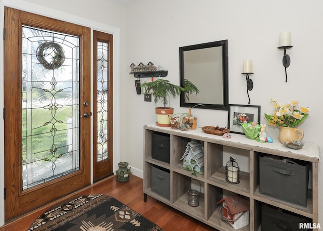entrance foyer with wood finished floors and baseboards