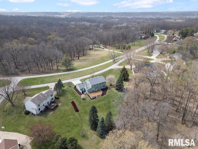 back of house with a yard, a wooden deck, central AC unit, and roof with shingles