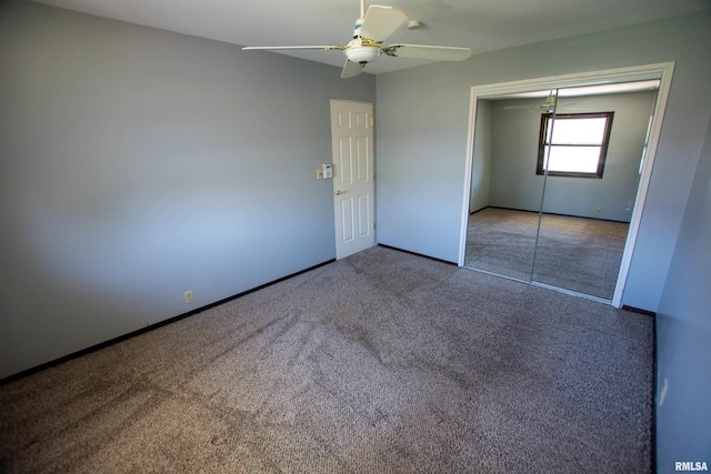 unfurnished bedroom featuring a closet, baseboards, a ceiling fan, and carpet