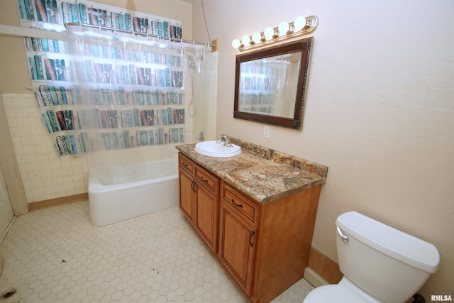 full bath with tile patterned floors, vanity, and toilet