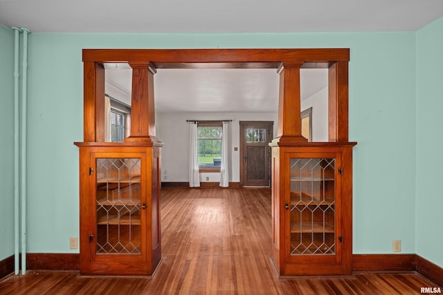 408 E Henry St, Atkinson, IL 61235 - hallway featuring hardwood / wood-style flooring and baseboards