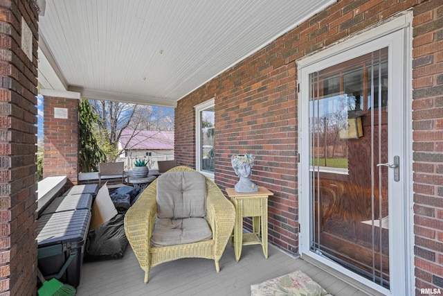 408 E Henry St, Atkinson, IL 61235 - wooden terrace featuring outdoor dining area