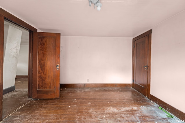 408 E Henry St, Atkinson, IL 61235 - empty room featuring hardwood / wood-style flooring and baseboards